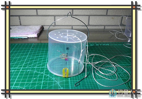 组装完成在罐体所需的位置开孔沉底打窝器制作,不锈钢丝制成的拎环